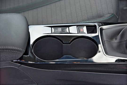 Cup holder between the front seats in the car