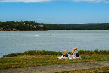 Taken at Hungry Point Reserve on the Cliff Top Walk in December 2025, this photo shows the coastline views toward Bundeena and Maianbar, with people enjoying hiking and coastal life.