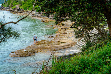 Taken at Hungry Point Reserve on the Cliff Top Walk in December 2025, this photo shows the coastline views toward Bundeena and Maianbar, with people enjoying hiking and coastal life.
