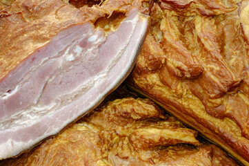 Smoked pork belly or brisket on the counter of a butcher shop