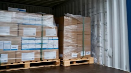 Medium shot of a shipping container with temperature sensors emphasizing climate control monitoring for sensitive cargo safety.