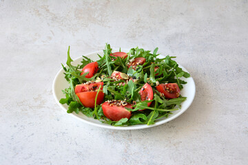 Arugula and Tomato Salad with Seeds cut out