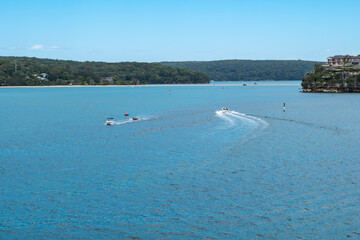 Taken at Hungry Point Reserve on the Cliff Top Walk in December 2025, this photo shows the coastline views toward Bundeena and Maianbar, with people enjoying hiking and coastal life.