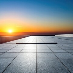 Empty paved plaza at sunset