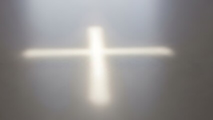 A serene cross illuminated in a gray background
