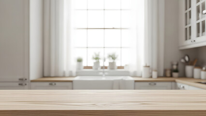 A blurry kitchen interior with a large window and wooden countertop