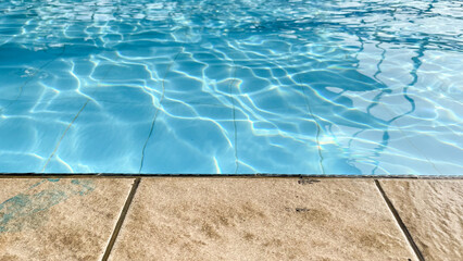 Poolside Edge Detail with Calm Water