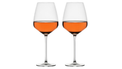 Isolated pair of glasses with amber colored liquor, elegant stemware for serving wine