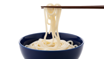 Isolated udon noodles being lifted from a blue bowl with wooden chopsticks for eating lunch
