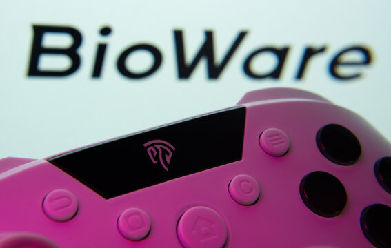 Dhaka, Bangladesh- 24 Mar 2025: A close-up of a gamepad with the BioWare seen on screen in the background.