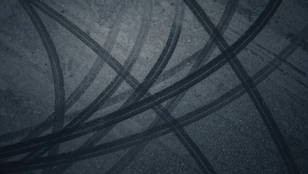 Top-down perspective of a drifting tire leaving marks on a race circuit, emphasizing vehicle handling and safety, World Car-Free Day