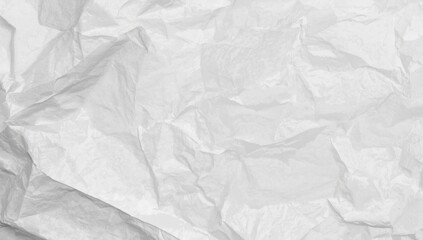 Fototapeta premium White crumpled recycle paper background serving as a backdrop for environmental messaging, aligned with Earth Day