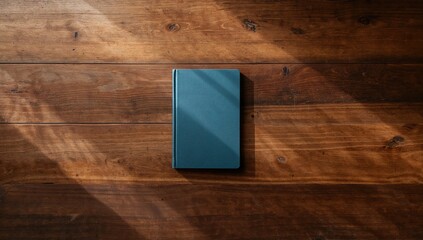 Unmarked book cover on a textured wooden background, designed as a neutral backdrop for text or graphics, International Literacy Day