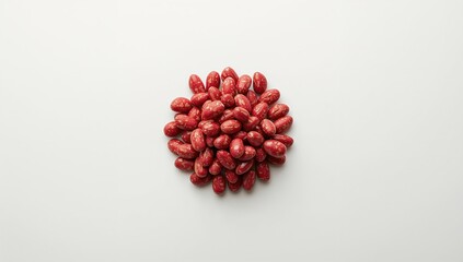 Colorful pinto beans with mottled and dried textures on white background, illustrating plant-based protein sources, Vegetarian Awareness Week