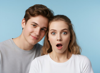 Man and woman showing contrasting emotions of surprise and calm. Young couple reacting differently to unexpected news or event for lifestyle concept.