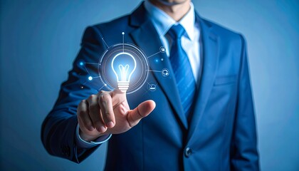 Businessman touching a glowing light bulb, symbolizing innovation and new ideas in a digital business environment.