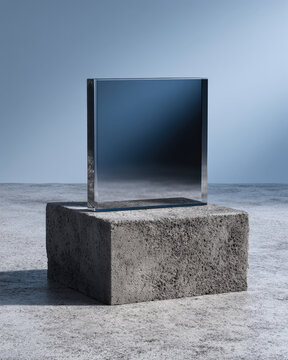 Blank e-ink display with beveled frame on concrete pedestal, minimalist device mockup