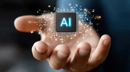 Human hand presents glowing AI microchip surrounded by luminous digital circuitry.