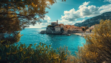 Mediterranean seaside village featuring water, cliffs, and trees, highlighting coastal architecture