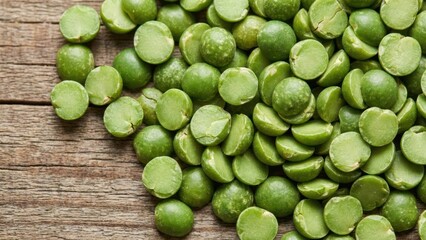 Close up of green split peas showcasing their round flat shape and vibrant color on surface