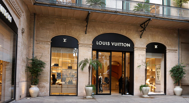 Palma, Mallorca, Spain - December 16, 2025: Louis Vuitton sign for advertising at store at Palma, Mallorca, Spain