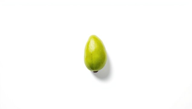 Single Averrhoa bilimbi fruit against plain background, emphasizing natural texture for culinary or health uses