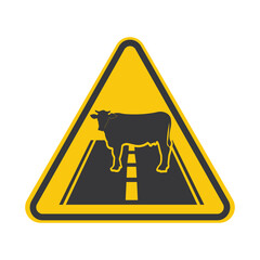 Yellows safety sign cow standing on roadway, caution sign symbol warning drivers about crossing animals, urging careful speed reduction.