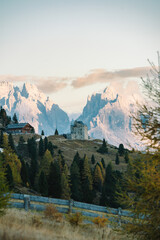 Mountain Plateau Landscape Scene - Prato Piazza Dolomites Italy - Autumn Fall Alpine rolling hills with forests and golden trees - castles, roads and mountains 