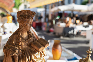 Old figurine of a saint at a flea market in Nice