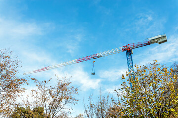 Crane ad blue sky
