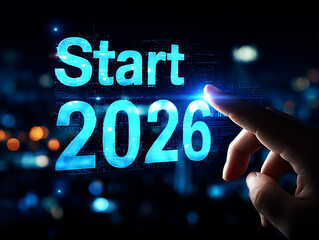 Texte en anglais "Start 2026" lumineux en lettres bleues futuristes touch&eacute;es par une main humaine sur fond technologique sombre avec lumi&egrave;res urbaines floues pour nouvel an, projets 2026 et objectifs 