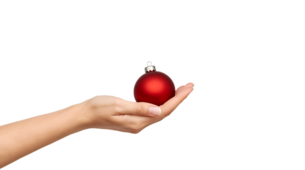 Red Christmas bauble resting on a cupped palm of a hand, PNG with alpha channel and professional background removal.
