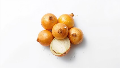 Yellow onion bulbs displayed for food preparation, highlighting their layered appearance