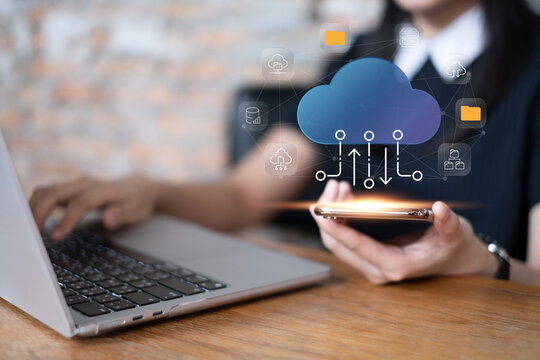 Businessman using cloud data to upload migration file document online wireless from storage server, futuristic innovation information technology concept