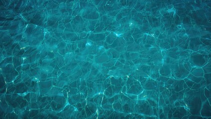 Obraz premium Top-down view of sea water with gentle waves, ideal for layout backgrounds in marine-themed projects