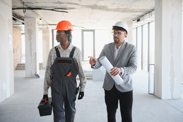 Diverse professionals collaborating on construction project