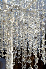 Close up of hanging crystal strands and LED lights Christmas decoration
