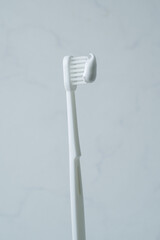 歯ブラシのヘッドと歯磨き粉のアップ