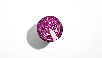 Chopped red cabbage prepared for culinary use on a plain white background, focusing on vegetable preparation techniques