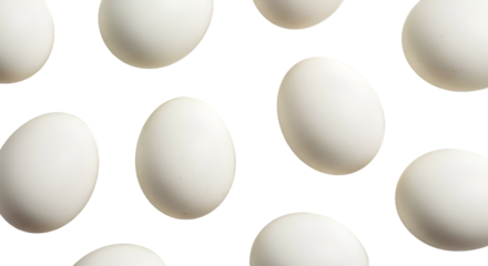Scattered white eggs on a black background food ingredient