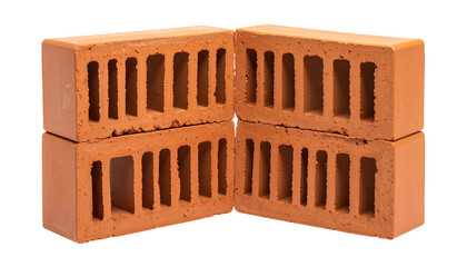Four red-orange rectangular blocks with vertical cavities, stacked in a corner