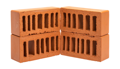 Four red-orange rectangular blocks with vertical cavities, stacked in a corner
