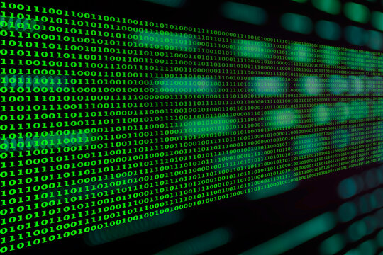 Abstract digital data transformation or Sci-Fi background featuring glowing green binary code flowing in perspective, symbolizing data, programming, cybersecurity, and modern information technology.