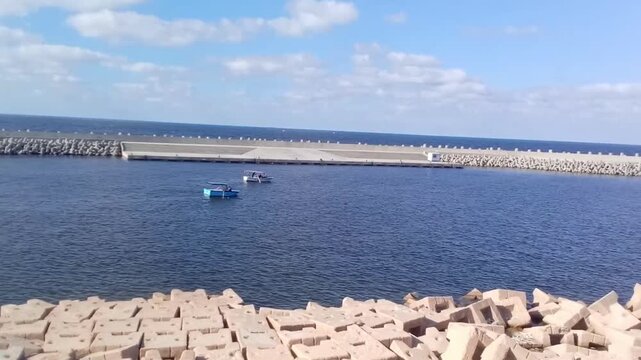 A great view of the Mediterranean Sea and some boats is available from behind Fort Qaitbay, also known as the Qaitbay Citadel. Sultan Al-Ashraf Qaitbay built the Qaitbay Citadel in 882 AH (1477 AD).
