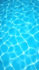 Obraz premium Bright blue swimming pool water with shimmering sunlight reflections