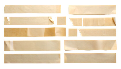Close-up of various tan, torn tape pieces arranged against a black background