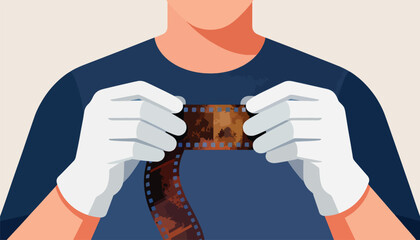 Person in white gloves holds old, damaged film strip