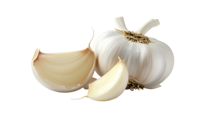 A white bulb of pungent spice with two cloves, isolated on a stark black background