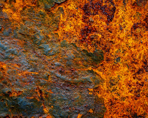 Rusty metal surface with shabby background paint. Blue cracked paint texture on an iron sheet. Fragment of an old metal door, Metal corrosion.