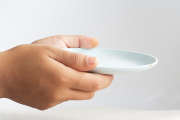 Offering Gesture with Plain Dish